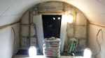 Applying Oldroyd Xv Clear to the walls and ceiling of the basement