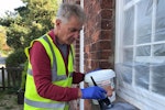 A Safeguard Europe Scientist applying Stormdry to the Herefordshire house