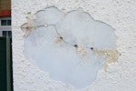 Cracked sand cement render leading to water ingress