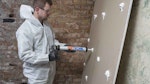 Rising damp fixed with the Dryzone Express Replasting System in Victorian Terraced House in Croydon