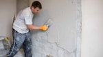 Damp-resistant plaster to combat penetrating damp in domestic property in Horsham